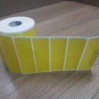 ETIQUETA 100X30/1 COUCHE ADESIVA AMARELA/SERRILHADA-32MTS
