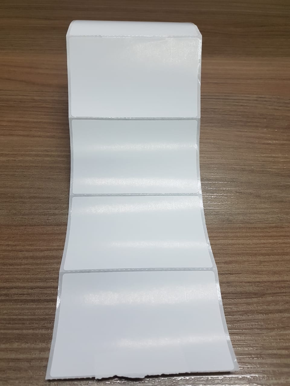 ETIQUETA 100X60/1 COUCHE ADESIVA / SERRILHADA - 32MTS