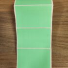 ETIQUETA 100X60/1 COUCHE ADESIVA/SERRILHADA/VERDE-32MTS