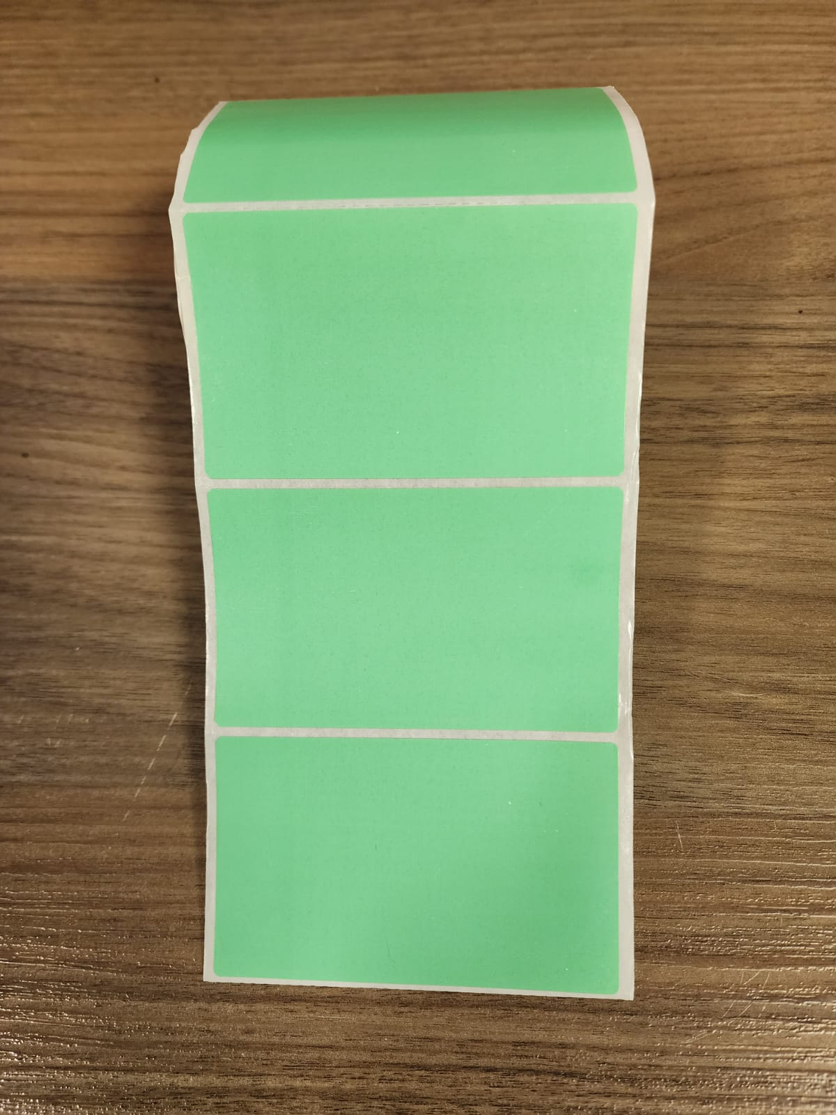 ETIQUETA 100X60/1 COUCHE ADESIVA/SERRILHADA/VERDE-32MTS