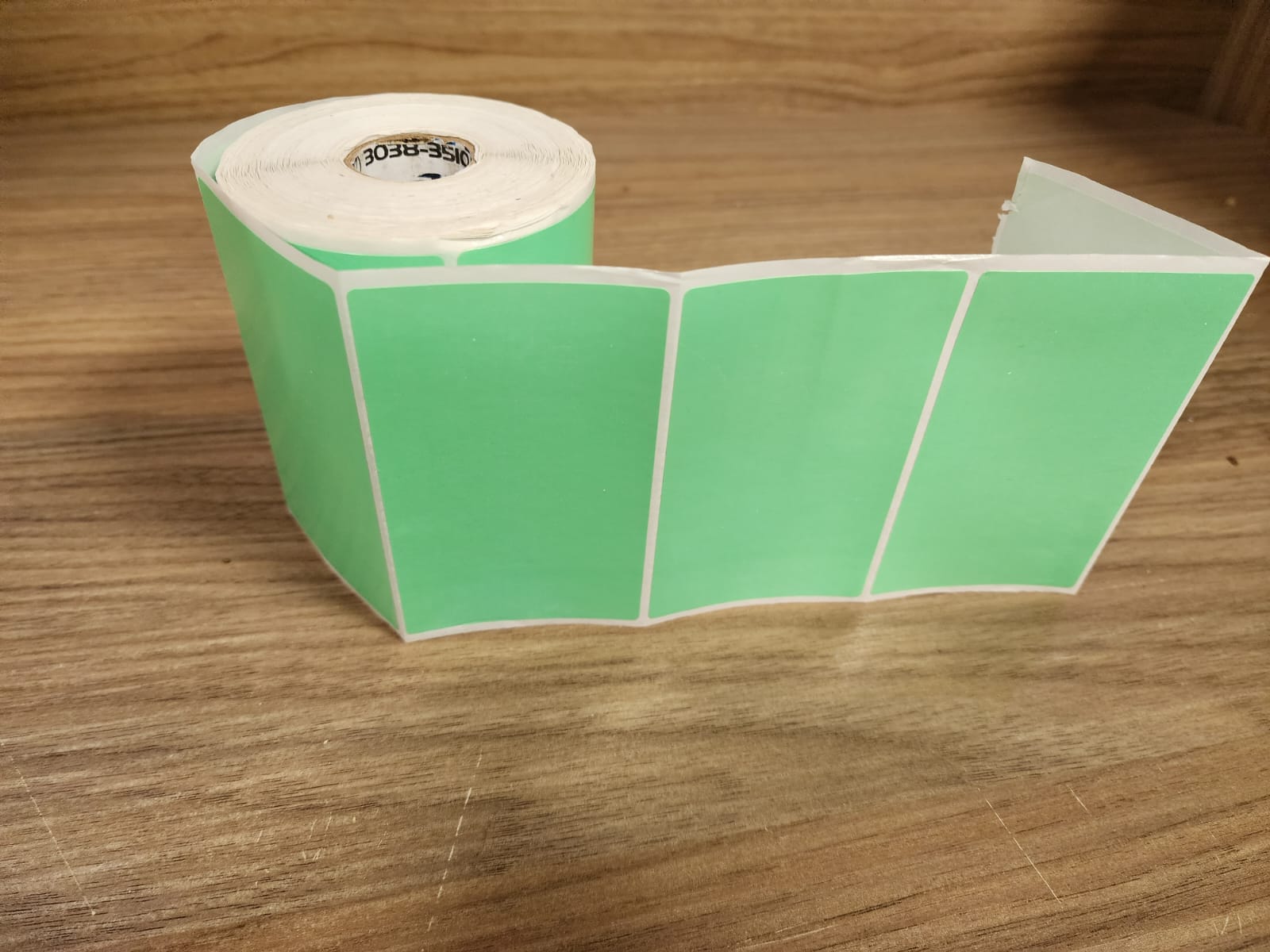 ETIQUETA 100X60/1 COUCHE ADESIVA/SERRILHADA/VERDE-32MTS