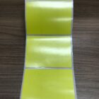 ETIQUETA 105X75/1 COUCHE ADESIVA AMARELA/SERRILHADA-32MTS