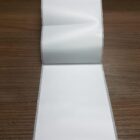 ETIQUETA 108X150/1 BOPP FOSCO/MEIO CORTE LINER/SERRILHADA-32MTS