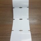 ETIQUETA 40X60/2 TAG/ADESIVA/MEIO CORTE/C.TARJA/FURO P/CIMA 18MM - 32 MTS