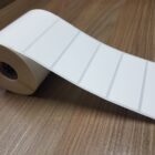 ETIQUETA 86X30/1 COUCHE ADESIVA-33MTS